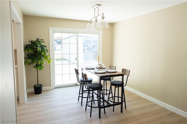 5699 Colgate Ave, Austintown, OH 44515 - dining room with baseboards and light wood-style floors