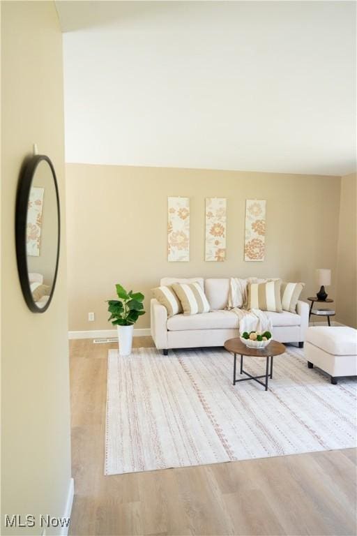 5699 Colgate Ave, Austintown, OH 44515 - living area featuring baseboards and wood finished floors