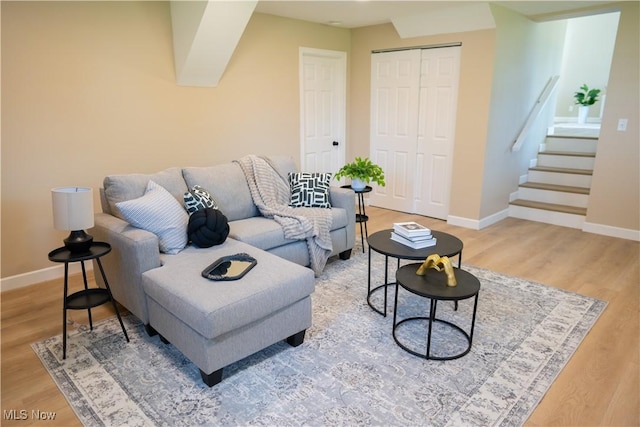 5699 Colgate Ave, Austintown, OH 44515 - living room with wood finished floors and stairway