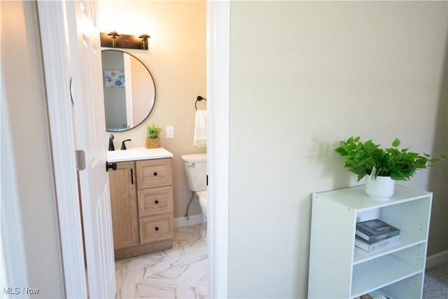 5699 Colgate Ave, Austintown, OH 44515 - half bath featuring vanity and marble look tiles