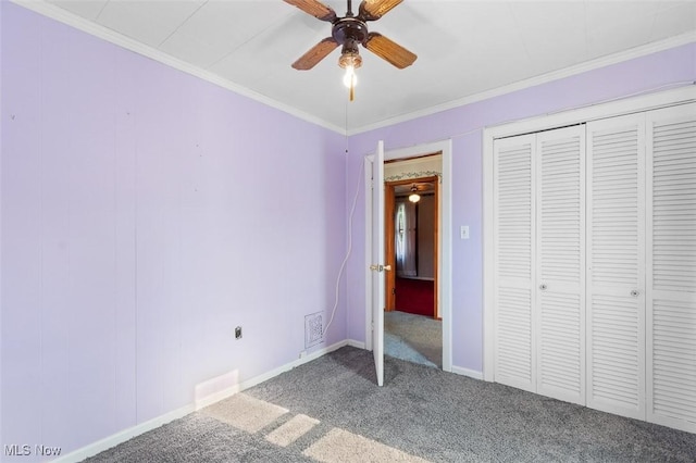 274 2nd St SW, Brewster, OH 44613 - unfurnished bedroom with carpet flooring, ornamental molding, a closet, and ceiling fan