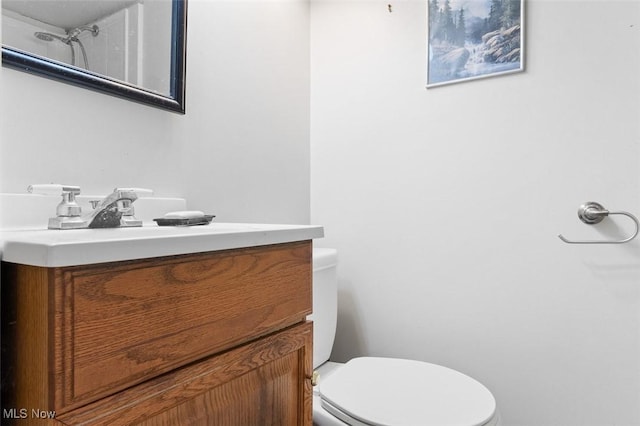 274 2nd St SW, Brewster, OH 44613 - bathroom featuring toilet and vanity