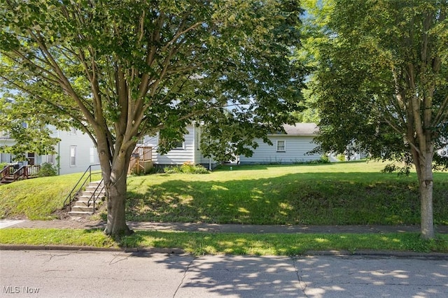 274 2nd St SW, Brewster, OH 44613 - obstructed view of property featuring a front yard