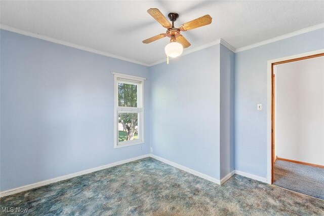 274 2nd St SW, Brewster, OH 44613 - empty room with ornamental molding, carpet, and a ceiling fan