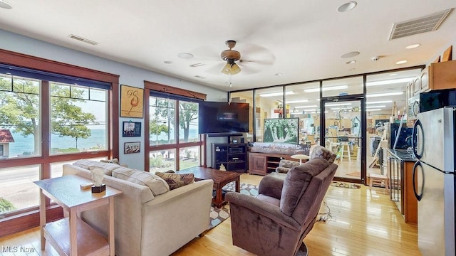 1431 Cedar Point Rd, Sandusky, OH 44870 - living room featuring ceiling fan, light wood-style floors, and recessed lighting