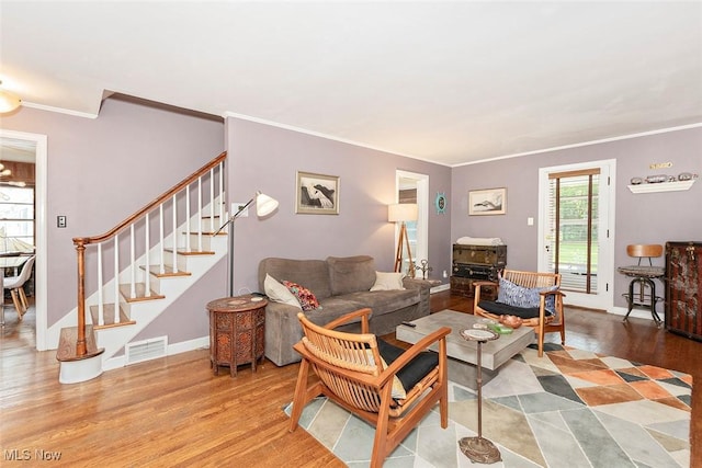 2215 S Belvoir Blvd, University Heights, OH 44118 - living area with crown molding, stairway, and wood finished floors