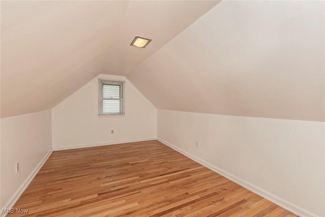 2215 S Belvoir Blvd, University Heights, OH 44118 - additional living space with light wood-style floors and lofted ceiling