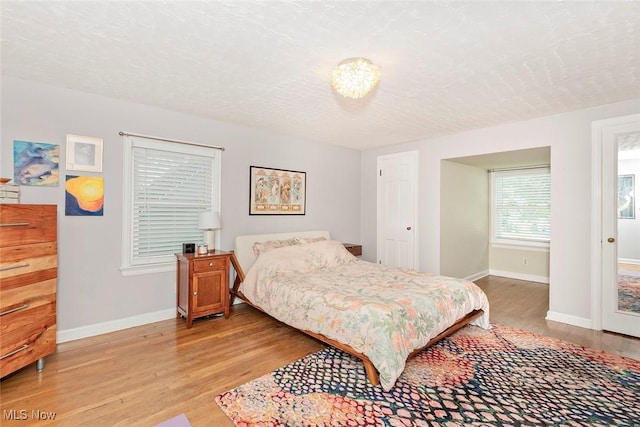 2215 S Belvoir Blvd, University Heights, OH 44118 - bedroom with light wood-style flooring