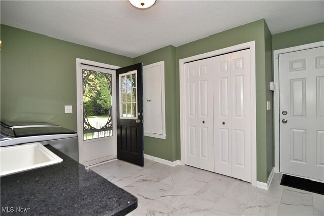 11919 Claridon Troy Rd, Chardon, OH 44024 - foyer entrance featuring light marble finish floors and baseboards