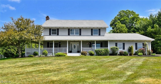 11919 Claridon Troy Rd, Chardon, OH 44024 - view of front of house with a chimney, a front lawn, and a porch