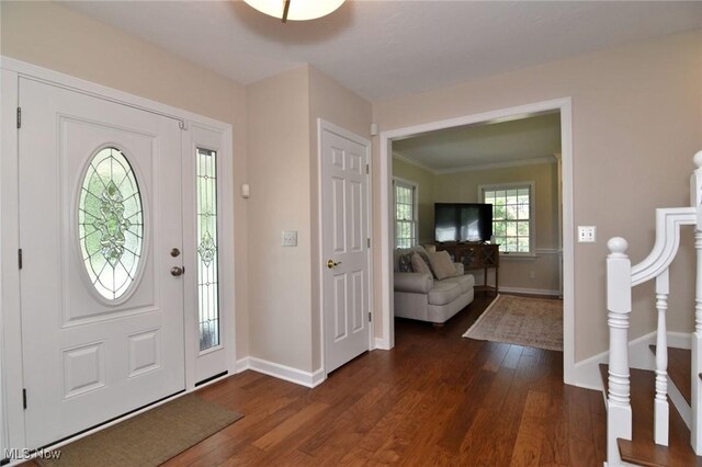 11919 Claridon Troy Rd, Chardon, OH 44024 - foyer with dark wood-style flooring and crown molding