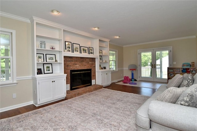 11919 Claridon Troy Rd, Chardon, OH 44024 - living area with dark wood finished floors, french doors, crown molding, and a fireplace
