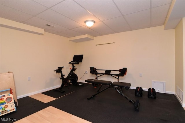 11919 Claridon Troy Rd, Chardon, OH 44024 - workout area with a paneled ceiling and baseboards