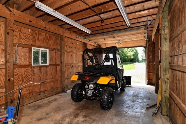 11919 Claridon Troy Rd, Chardon, OH 44024 - garage featuring wood walls