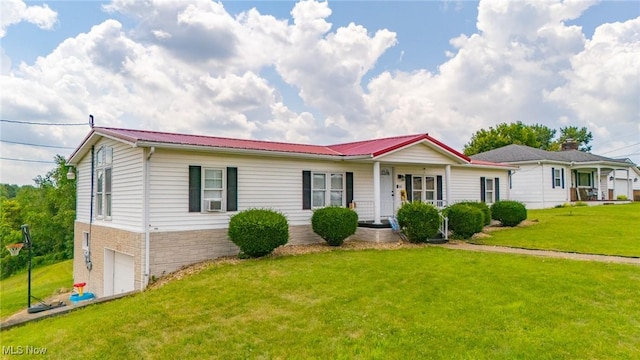 208 Jefferson Blvd, Mingo Junction, OH 43938 - view of front of house with a front yard, an attached garage, and a metal roof