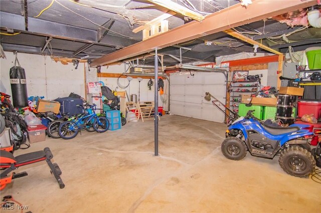 208 Jefferson Blvd, Mingo Junction, OH 43938 - garage featuring a garage door opener