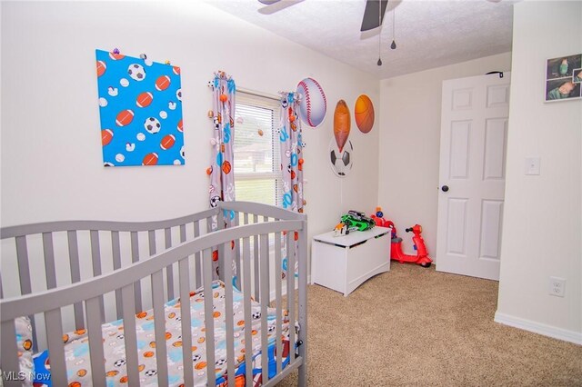 208 Jefferson Blvd, Mingo Junction, OH 43938 - carpeted bedroom with a crib and ceiling fan