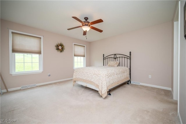 125 Fitch Blvd Unit 263, Austintown, OH 44515 - bedroom with light colored carpet and a ceiling fan