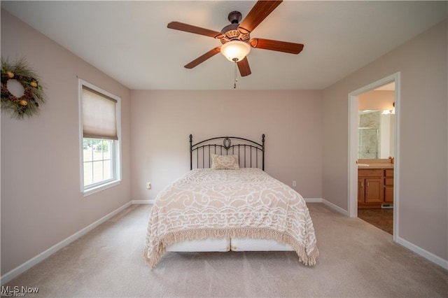 125 Fitch Blvd Unit 263, Austintown, OH 44515 - bedroom featuring light carpet, a ceiling fan, and ensuite bathroom