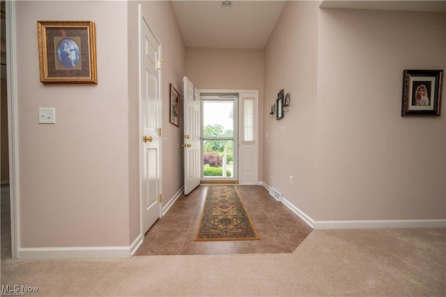 125 Fitch Blvd Unit 263, Austintown, OH 44515 - doorway with carpet and tile patterned flooring