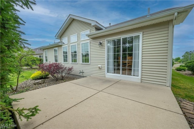 125 Fitch Blvd Unit 263, Austintown, OH 44515 - rear view of property with a patio area