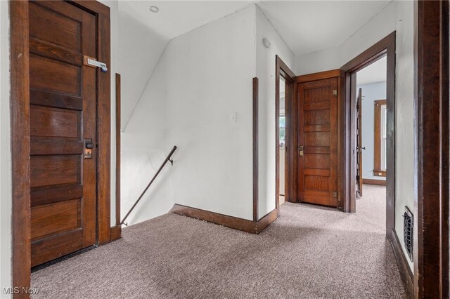 415 N Columbus St, Crestline, OH 44827 - hallway with an upstairs landing and carpet flooring