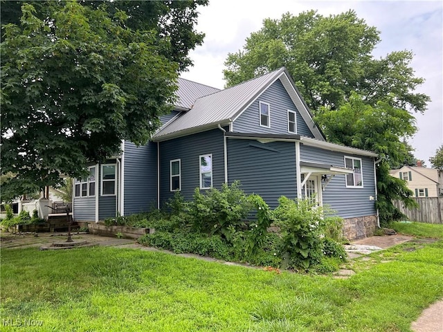 45055 N Ridge Rd, Amherst, OH 44001 - view of property exterior with a metal roof