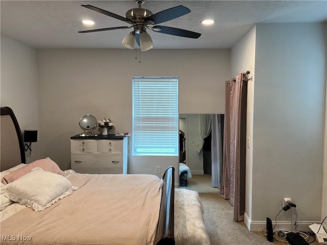 45055 N Ridge Rd, Amherst, OH 44001 - bedroom featuring light carpet, ceiling fan, and recessed lighting