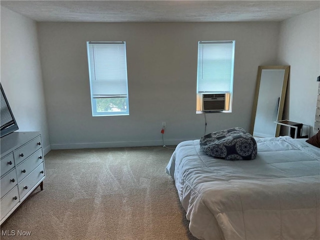 45055 N Ridge Rd, Amherst, OH 44001 - carpeted bedroom featuring cooling unit and baseboards