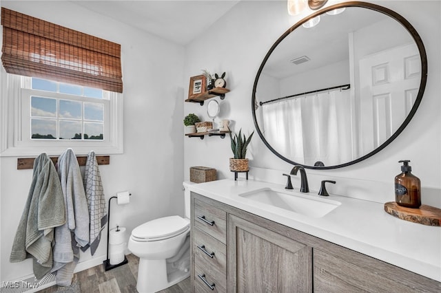 12208 State Route 113, Wakeman, OH 44889 - bathroom with vanity and wood finished floors