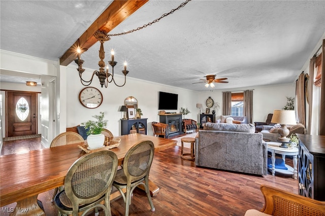 12208 State Route 113, Wakeman, OH 44889 - dining room with a textured ceiling, wood finished floors, a ceiling fan, and a chandelier