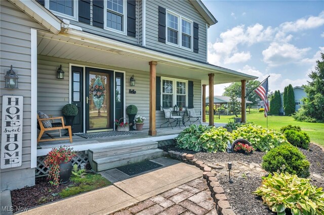 12208 State Route 113, Wakeman, OH 44889 - view of exterior entry with covered porch
