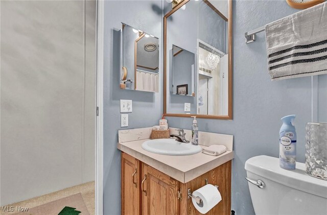 16 Piccolo, Olmsted Twp, OH 44138 - bathroom featuring vanity and toilet