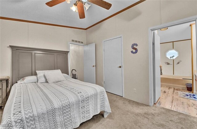 16 Piccolo, Olmsted Twp, OH 44138 - carpeted bedroom featuring crown molding, a ceiling fan, connected bathroom, and high vaulted ceiling