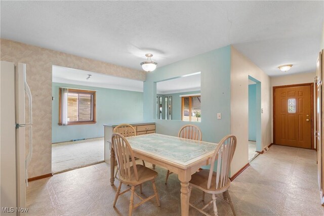 4899 Autumn Ln, Brooklyn, OH 44144 - dining area with baseboards and light floors