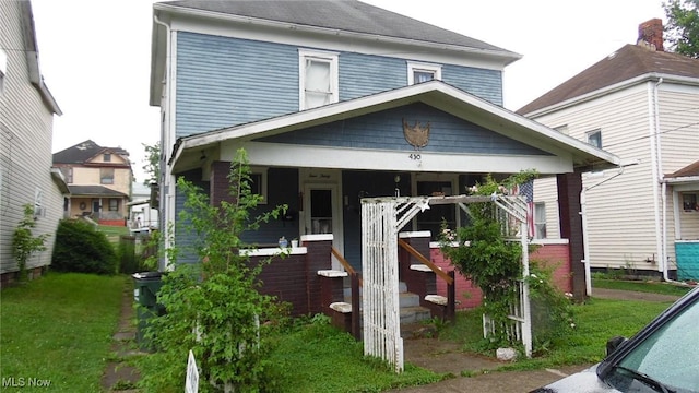 430 S 3rd St, Coshocton, OH 43812 - american foursquare style home with covered porch