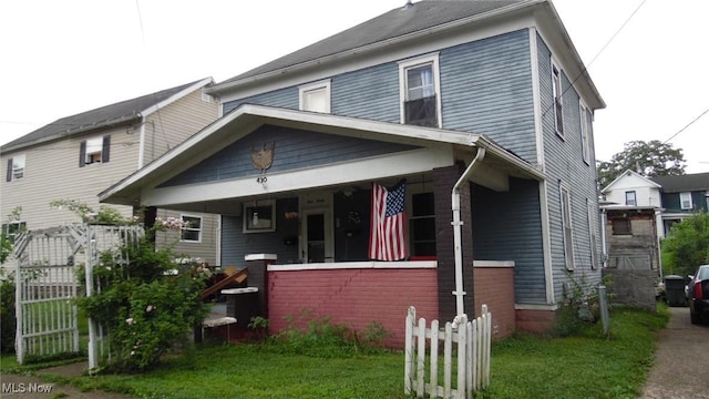 430 S 3rd St, Coshocton, OH 43812 - view of front of house with covered porch