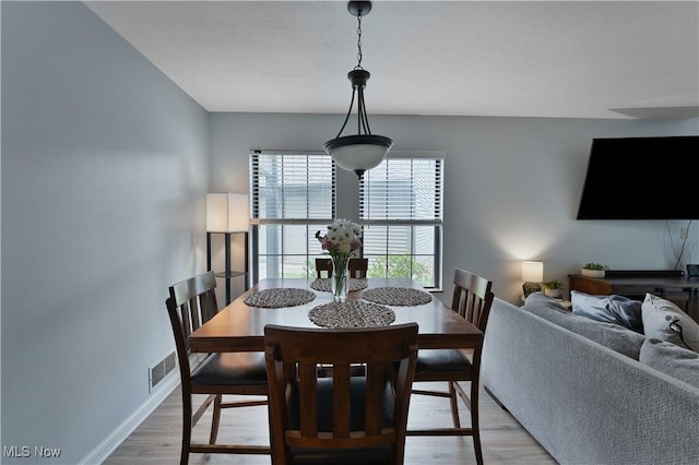 1173 Red Tail Hawk Ct Unit 4, Youngstown, OH 44512 - dining area featuring light wood finished floors and baseboards