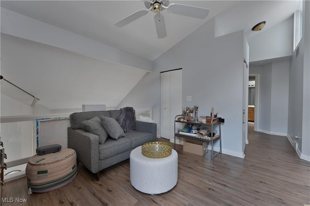 1173 Red Tail Hawk Ct Unit 4, Youngstown, OH 44512 - living room featuring vaulted ceiling, wood finished floors, and a ceiling fan
