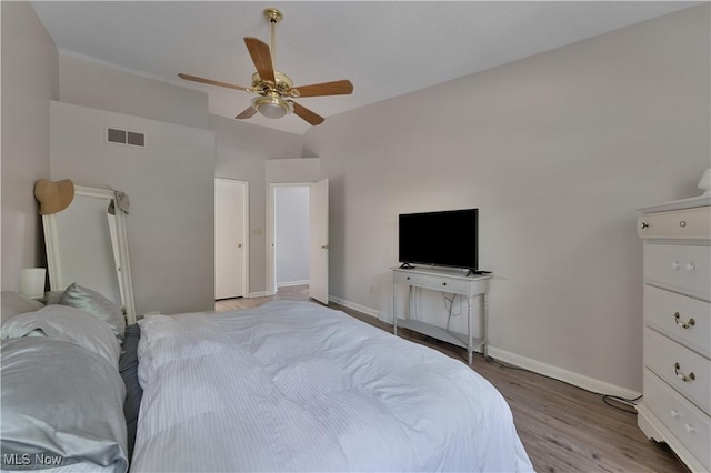 1173 Red Tail Hawk Ct Unit 4, Youngstown, OH 44512 - bedroom featuring light wood finished floors, vaulted ceiling, and a ceiling fan