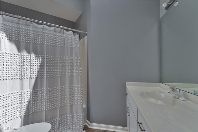 1173 Red Tail Hawk Ct Unit 4, Youngstown, OH 44512 - full bathroom featuring vanity, a shower with curtain, and wood finished floors