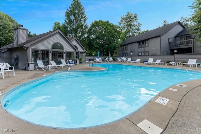 1173 Red Tail Hawk Ct Unit 4, Youngstown, OH 44512 - community pool featuring a patio