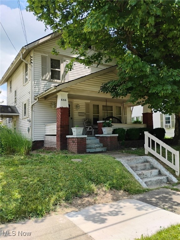 666 S Rockhill Ave, Alliance, OH 44601 - view of front of house featuring a porch