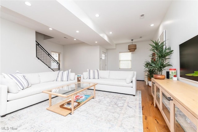 1906 W 47th St, Cleveland, OH 44102 - living room with recessed lighting, light wood finished floors, and stairway