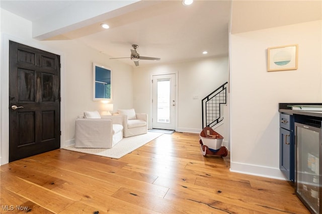 1906 W 47th St, Cleveland, OH 44102 - living area featuring wine cooler, light wood-style flooring, stairway, recessed lighting, and ceiling fan