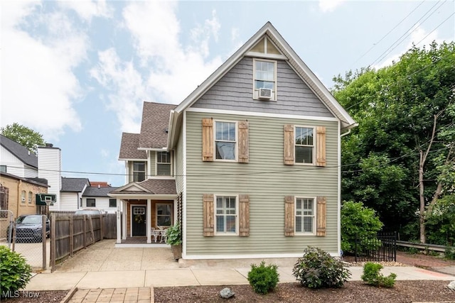 1906 W 47th St, Cleveland, OH 44102 - view of front facade featuring a patio area and cooling unit