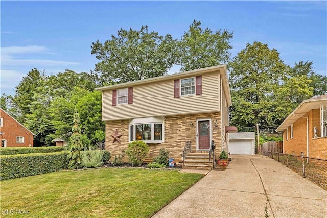 4090 Ridgeview Rd, Cleveland, OH 44144 - colonial home with a garage, an outbuilding, brick siding, and entry steps