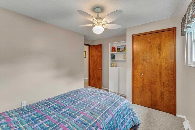 4090 Ridgeview Rd, Cleveland, OH 44144 - bedroom featuring carpet, a closet, and a ceiling fan