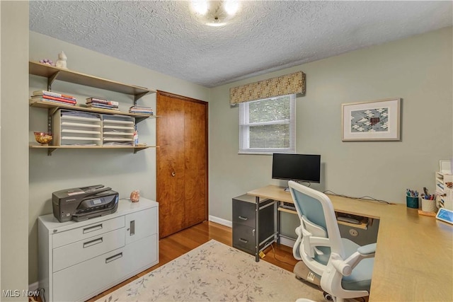 4090 Ridgeview Rd, Cleveland, OH 44144 - office space with wood finished floors and a textured ceiling