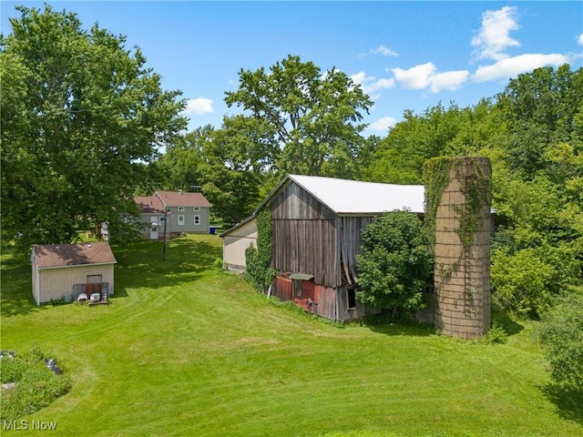 12456 Sheldon Rd, Mantua, OH 44255 - view of green lawn with an outbuilding